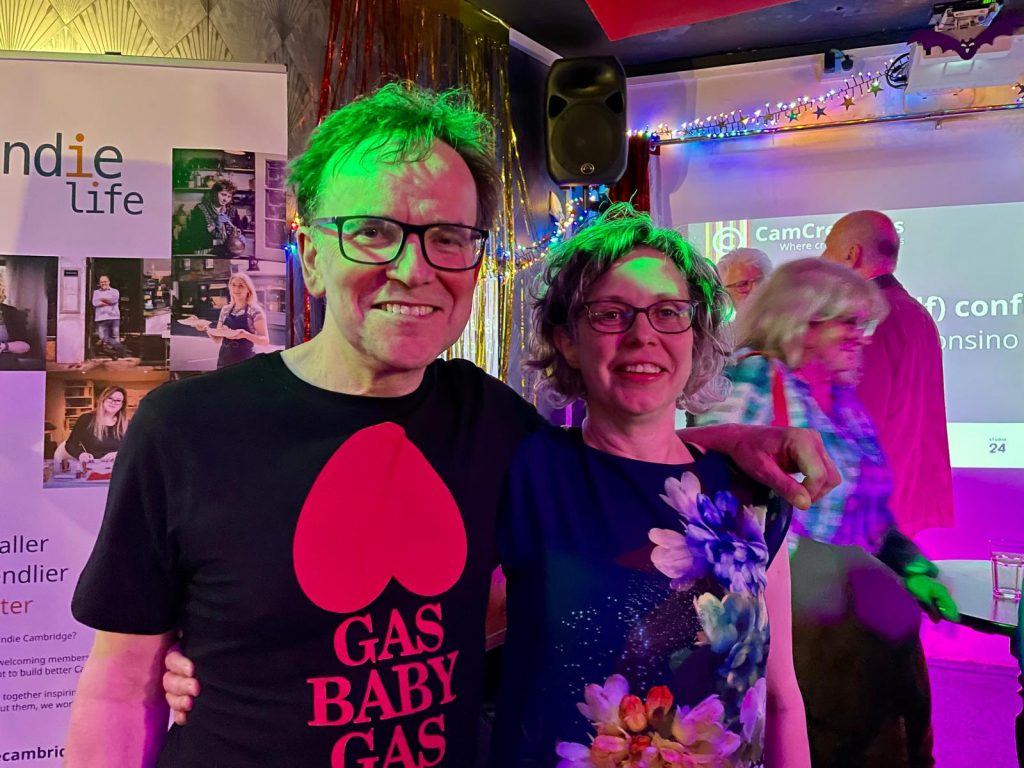 Two CamCreatives members smiling at the camera after an event.